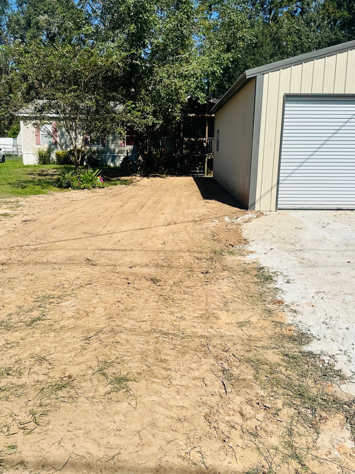 Graded driveway leading up to a residential garage
