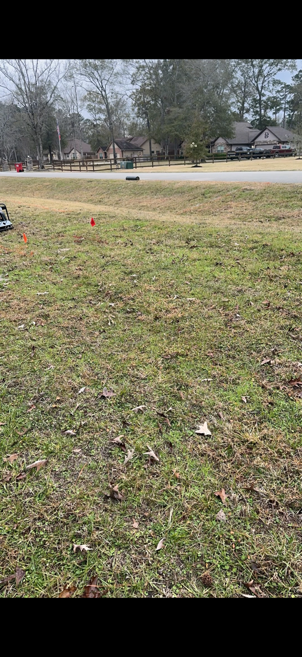 Front-yard culvert line marked and staked for installation